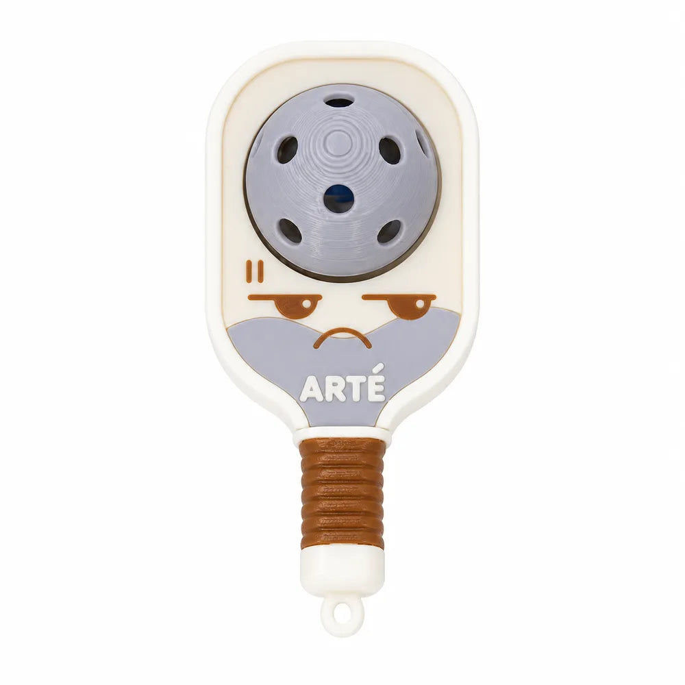 Grumpsy Clicker: a cream and pale blue mini paddle charm with a ball and a grumpy face